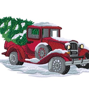 May include: Embroidered image of a vintage red truck carrying a green Christmas tree covered in snow. The truck has gray wheels and is driving through a snowy landscape. A festive holiday design.