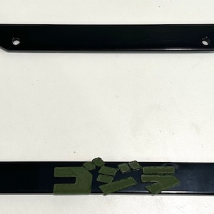 g0dzillA Super Hero Lizard Kanji in 3D - Black w Army Green Automobile License Plate Frame - Monster