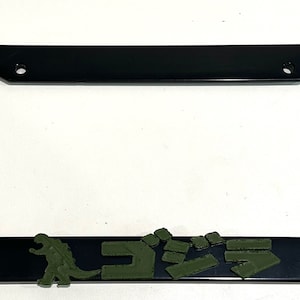 g0dzillA Super Hero Lizard Kanji with Silhouette in 3D - Black w Army Green Automobile License Plate Frame - Monster