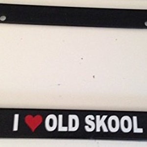 May include: Black license plate frame with a white "I love old skool" text and a red heart.