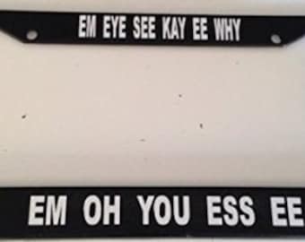 Mickey the name Spelled Out &quot; Em Eye See Kay EE Why Em Oh You Ess Ee &quot;  - Black Automobile License Plate Frame