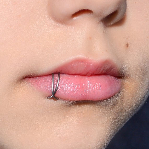 Titanium lip deals ring