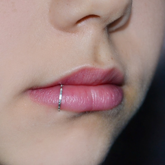 Fake lip piercings are the latest way to add some edge to your look