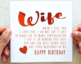 May include: A red and white card with the word "Wife" in large red letters. The card has a message that says "When I tell you I love you, I do not say it out of habit or to make conversation. I say it to remind you that you are the best thing that has ever happened to me. Happy Birthday."