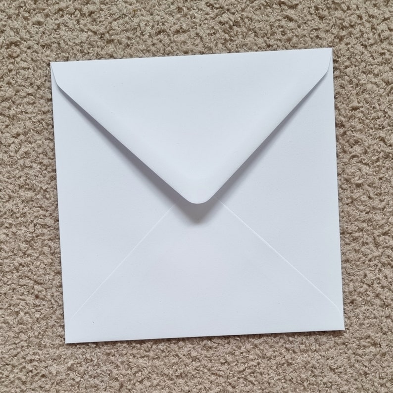 Comes with a white envelope.