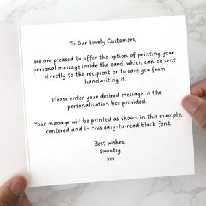 May include: A white greeting card with black text. The text reads: "To Our Lovely Customers, We are pleased to offer the option of printing your personal message inside the card..." The card is held by a person.