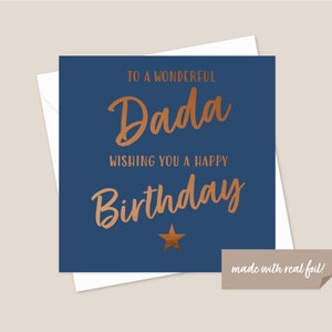 May include: A blue card with gold foil lettering that says "To a wonderful Dada Wishing you a happy Birthday" with a gold star. The card has the text "made with real foil!" at the bottom.