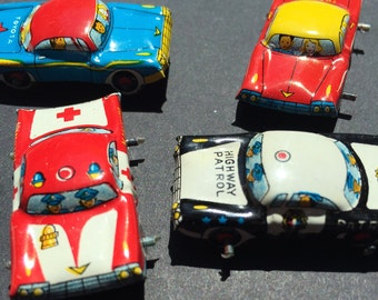 4 Vintage Japanese 1960s TIN CARS 35mm long
