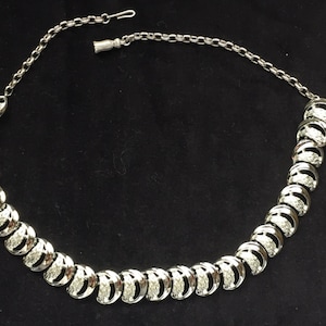 Silver tone half moon necklace