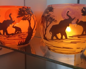 Hand painted elephant with trunk up candle holder in glass