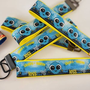 Key fobes/ key chain/clown fish/ dory/memory loss