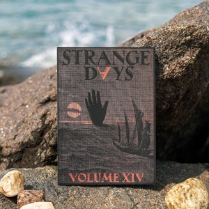 May include: A book titled "Strange Days" with a dark background and a hand reaching up towards a ship. The book is volume XIV.