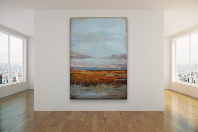 May include: Abstract landscape painting with a blue sky, orange and brown fields, and a reflection of the sky in the water.