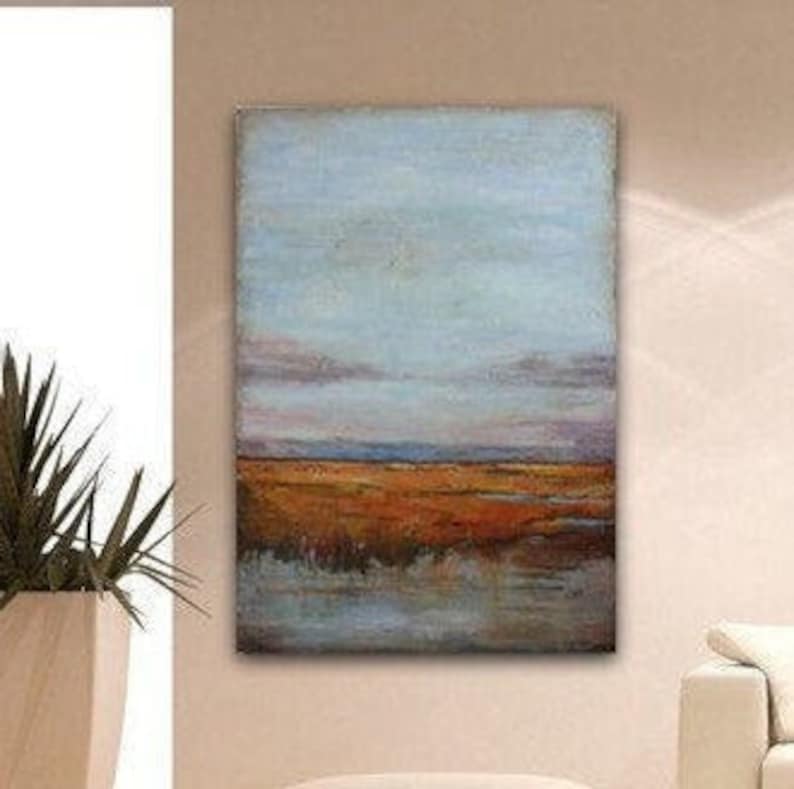 May include: Abstract landscape painting with a blue sky, brown field, and water in the foreground.