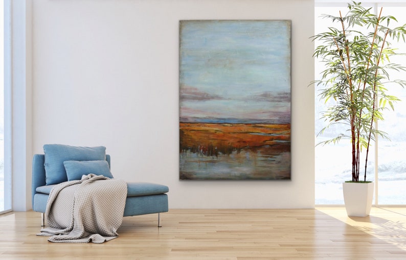 May include: Abstract landscape painting with a blue sky, orange and brown field, and a reflection of the sky in the water.