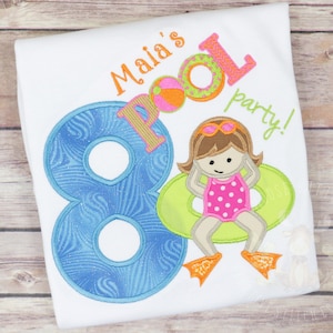 May include: A white t-shirt with blue, green and orange embroidery. The embroidery includes the number 8, the words "Malia's Pool Party!" and a cartoon girl wearing a pink swimsuit and a green float.