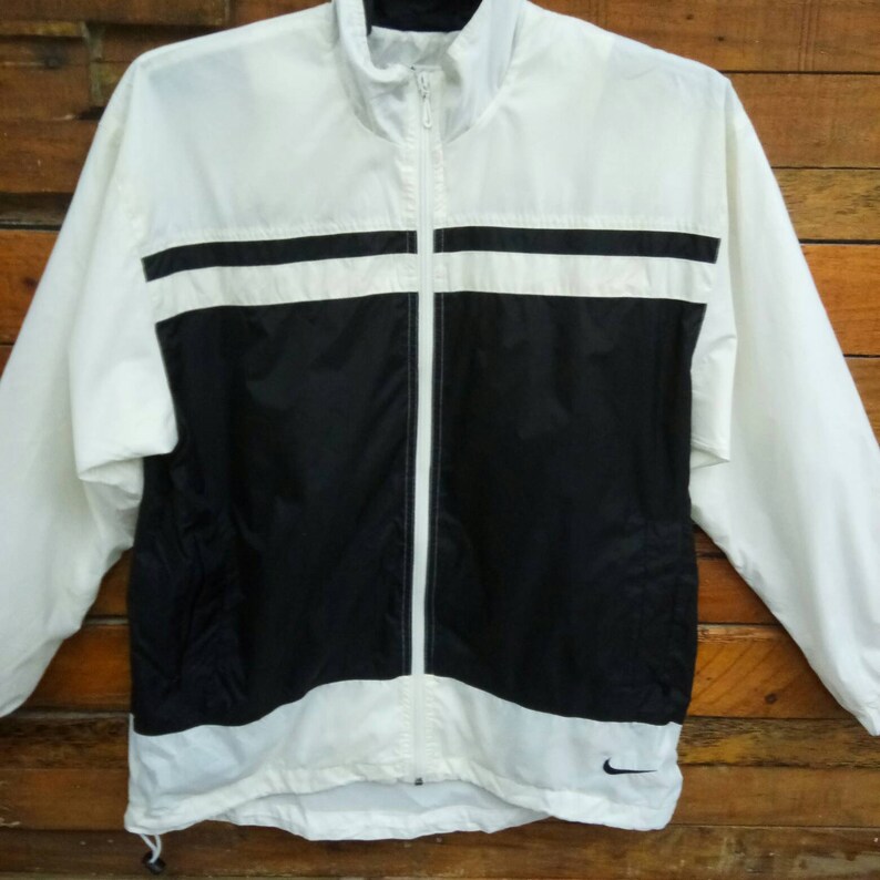 zip up windbreaker nike