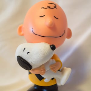 There&#39;s always a reason to smile print featuring Snoopy and Charlie Brown