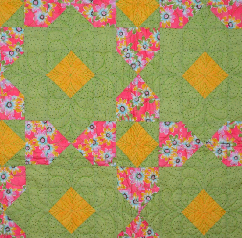 Green and Pink Floral Quilt