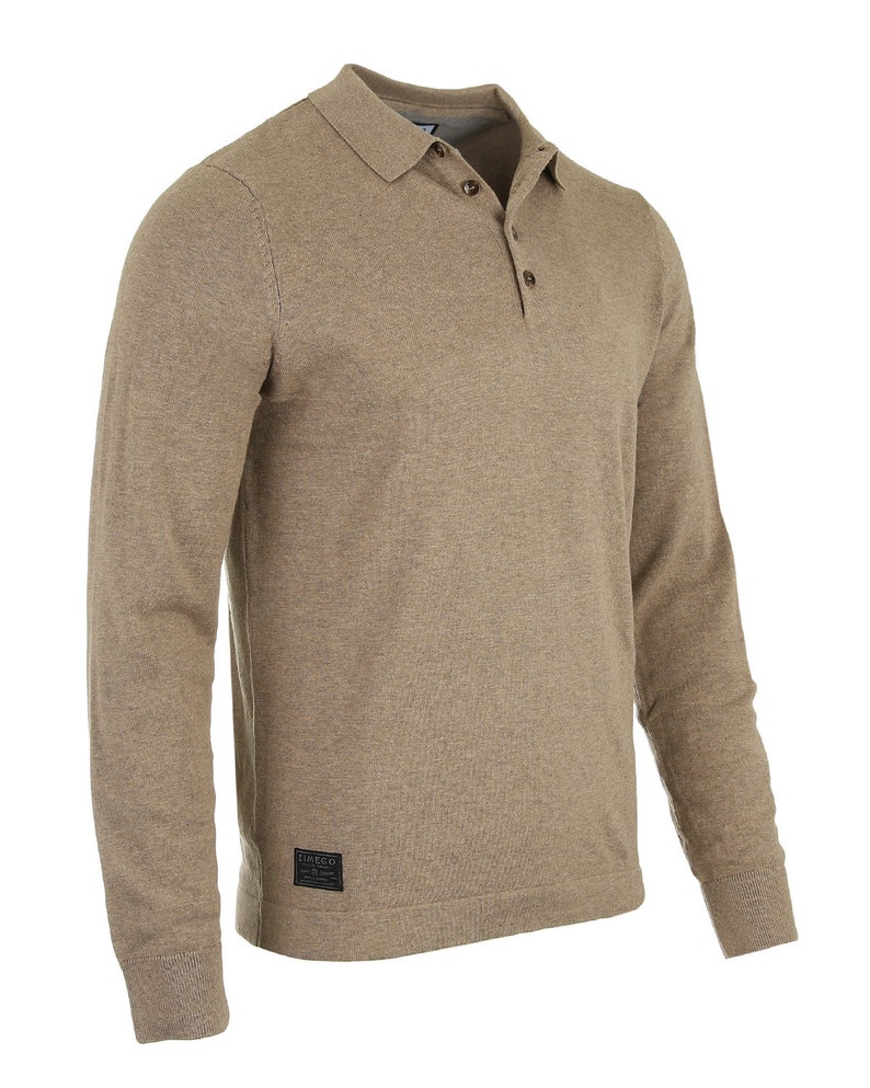 May include: A long-sleeved, light brown knitted polo shirt with a button-up collar and a small black patch label with the text "Dingo" on the bottom right side.
