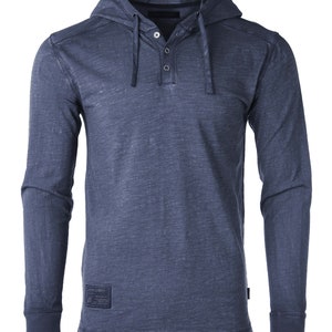 May include: A dark blue long-sleeved hooded shirt with a button-up placket and a drawstring hood.