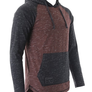 May include: A maroon and black long-sleeve hooded sweatshirt with a kangaroo pocket. The sweatshirt has a raglan sleeve design and a small logo patch on the pocket.