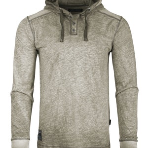 May include: A long-sleeved hooded shirt with a button-up placket and a drawstring hood. The shirt is a light green color with a distressed, faded look.