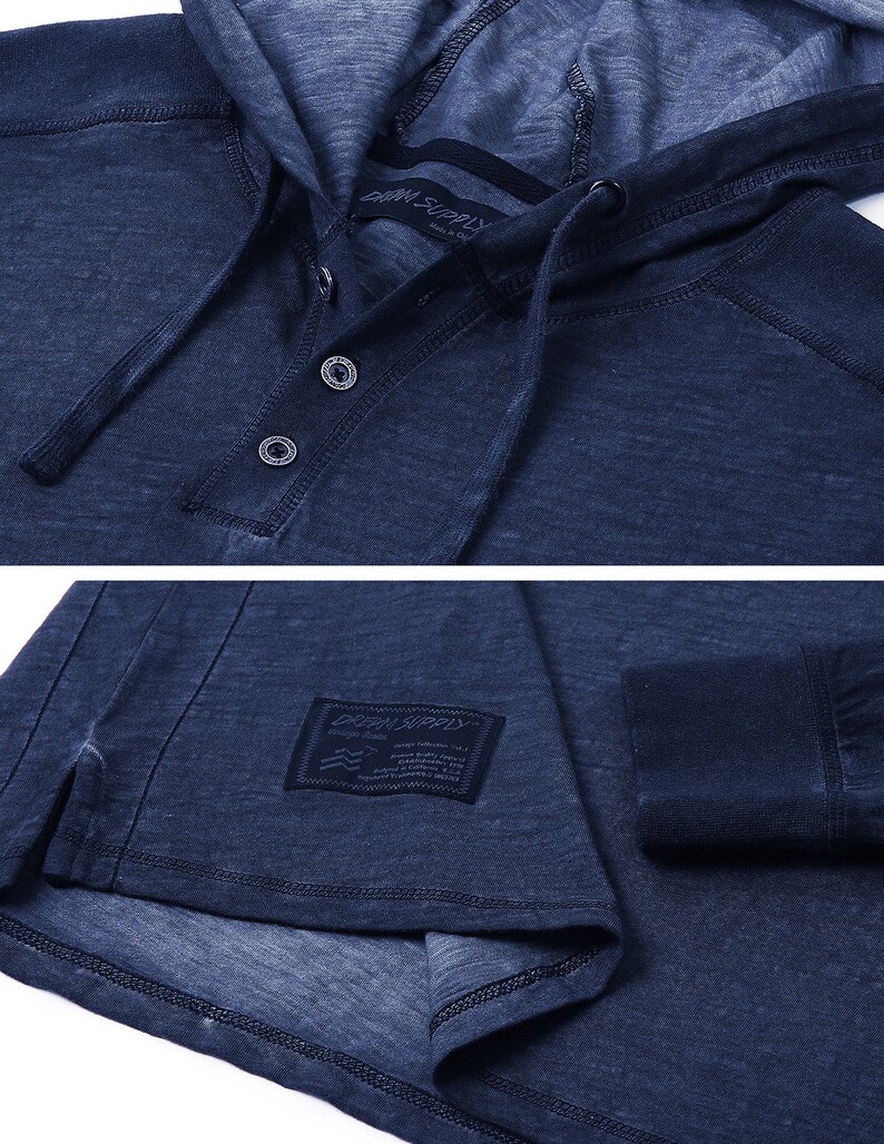 May include: A dark blue long-sleeved hooded shirt with a button-up front and a small label that reads "DRIFT SUPPLY" on the left side of the shirt.