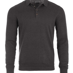 May include: A charcoal gray long-sleeved polo shirt with a button-up collar and a small logo on the left sleeve.