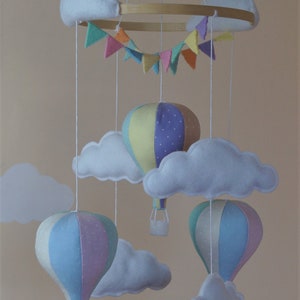 Unisex hot air balloon nursery baby mobile with bunting in pastel rainbow