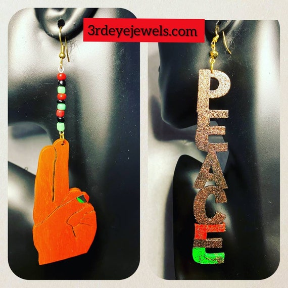 The Mixed-Up Pair:  Peace Dangle Earring paired with the Kemetic Peace Sign