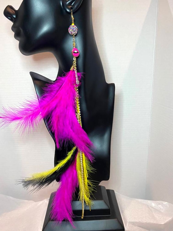 Exotic Mixed Matched Earrings: Hand painted FLY paired with feathers and chain earring.