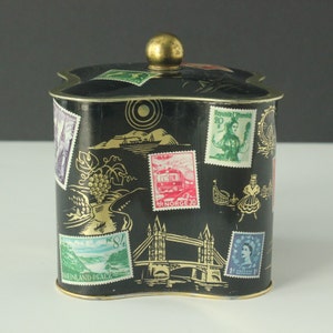 Vintage West Germany Quatrefoil Shaped Black European Travel Stamps Landmarks Tin Cannister image 1