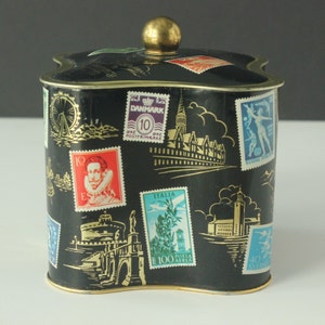 Vintage West Germany Quatrefoil Shaped Black European Travel Stamps Landmarks Tin Cannister image 2