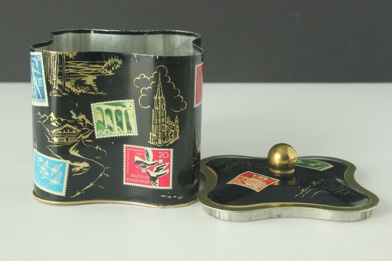 Vintage West Germany Quatrefoil Shaped Black European Travel Stamps Landmarks Tin Cannister image 3