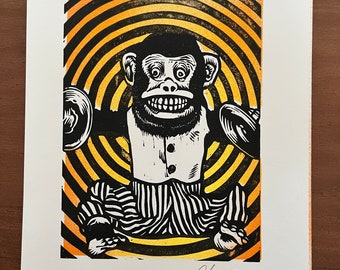 Cymbal playing monkey hand pulled linoleum block print signed by the artist chimpanzee