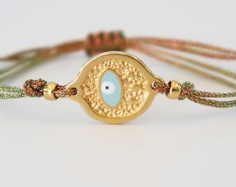 Goud en blauwe beschermende boze oog vriendschapsarmband - verstelbare macramé-wensarmband