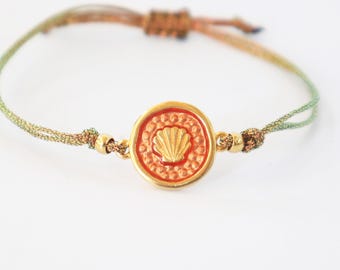 Gold-Tone Sea Shell Medallion Bracelet, Adjustable Cord, Coastal Jewelry