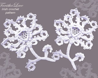 May include: Two white Irish crochet lace floral motifs with stems and leaves. The text Tanitka Lace Irish crochet pattern is visible in the upper left corner. The intricate needlework features openwork centres and swirling, textured petal edges.