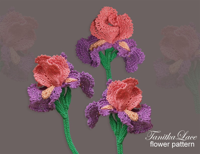 May include: Three handmade crochet iris flowers. The flowers have peach-colored petals, purple outer petals, and green stems. The image includes the text "Tanitka Lace flower pattern".