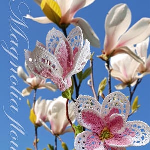 May include: A close-up of a crochet magnolia flower with white and pink petals, set against a blue sky. The flower is detailed with intricate lace patterns. The image also includes the text "Magnolia Flower" and "Tanitka Lace flower pattern".