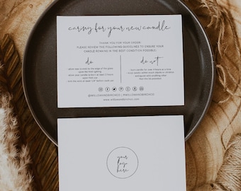May include: A white card with the text "caring for your new candle" and instructions on how to care for a candle. The card is on a wooden tray with a ball of twine and a dried grass plume.