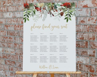 May include: A white wedding seating chart with a wintery floral design at the top. The chart lists guest names by table number. The text at the top reads "Please find your seat". The bottom of the chart reads "Willow & Liam".