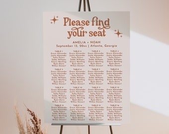 May include: A white sign with brown text on an easel. The sign says "Please find your seat" and lists the names of guests for a wedding reception. The wedding is for Amelia and Noah on September 13th in Atlanta, Georgia.