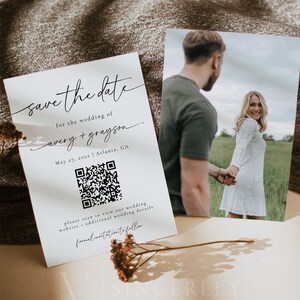 May include: A white save the date card with black text. The text reads "save the date" for the wedding of Avery + Grayson. The date is May 27, 20xx in Atlanta, GA. A QR code is included with the text "Please scan to view our wedding website + additional wedding details. Formal invitation to follow."