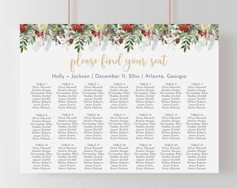 May include: A wedding seating chart with a wintery floral design. The chart lists tables numbered 1 through 21 with guest names for each table. The text at the top reads "please find your seat" followed by "Holly + Jackson | December 11, 20xx | Atlanta, Georgia".