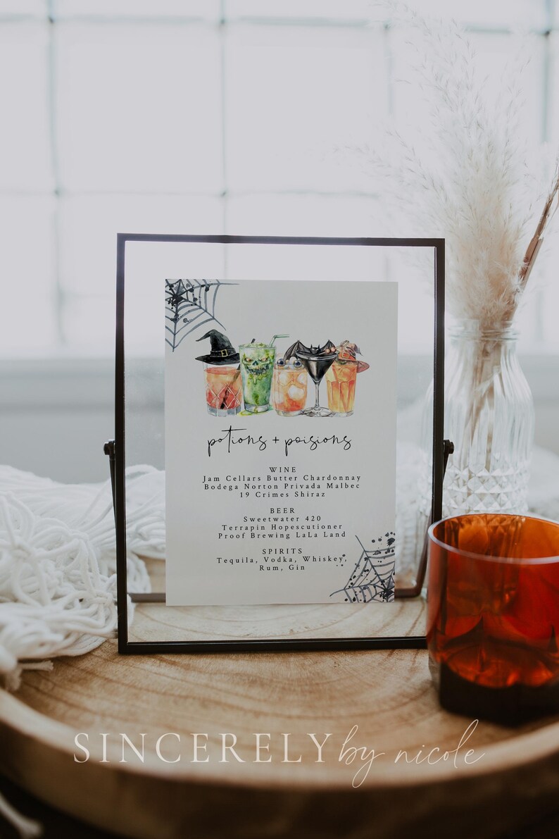 legant Halloween drinks bar sign with fun illustrations of spooky cocktails. The drinks list features wine, beer, and spirits, framed by seasonal elements like cobwebs, ideal for a Halloween event.