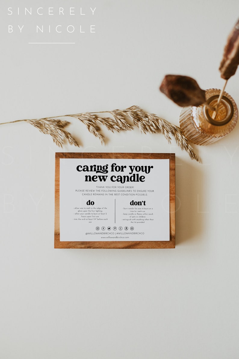 May include: A wooden sign with the text "caring for your new candle" and instructions on how to care for a candle. The sign is on a white background with dried grass and a glass jar.