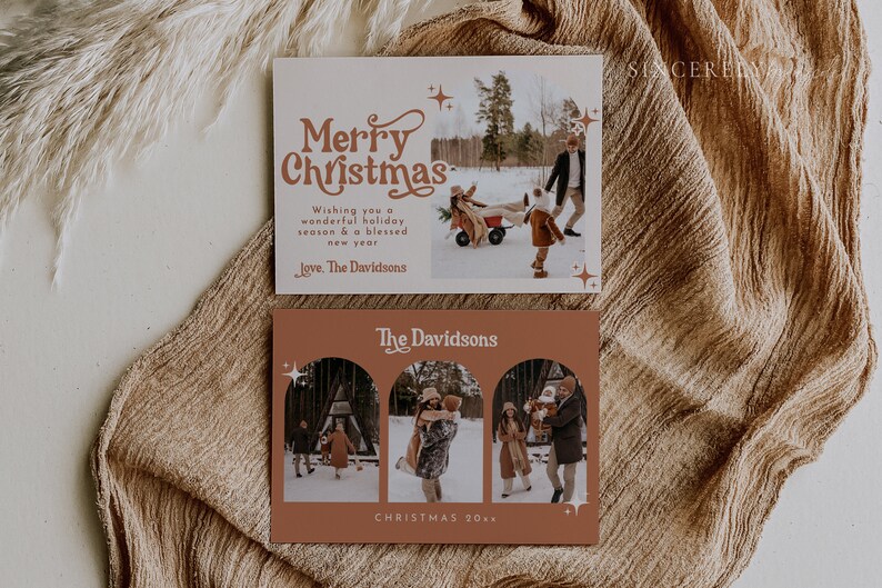 May include: A Christmas card with a photo of a family in a snowy setting. The card has a brown background with a white border and the text "Merry Christmas" in a festive font. The text "Wishing you a wonderful holiday season & a blessed new year" is also included, along with the family's name, "The Davidsons".