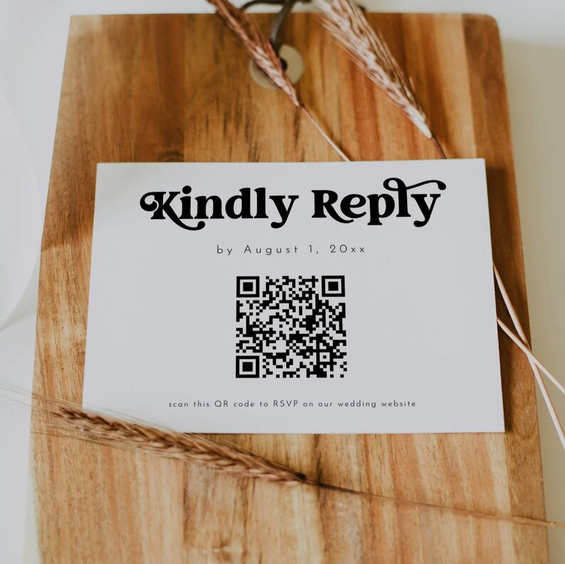 May include: A white card with black text that reads "Kindly Reply by August 1, 20xx". A black and white QR code is below the text with the caption "scan this QR code to RSVP on our wedding website".